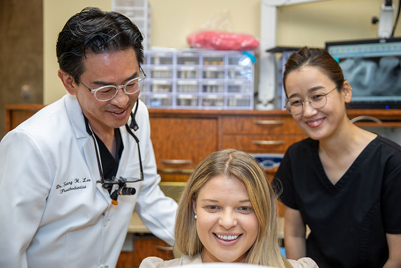 Dr. Seung with dental patient